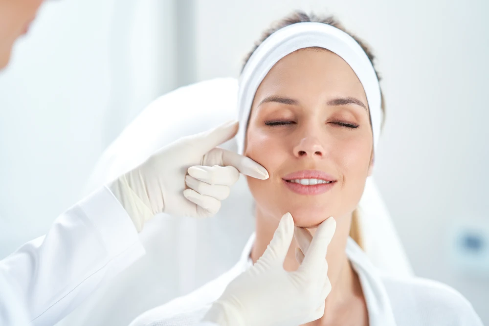 Woman receiving a med spa consultation with a dermatologist.