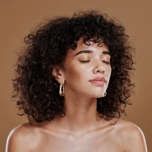 Woman with radiant skin after med spa treatments.