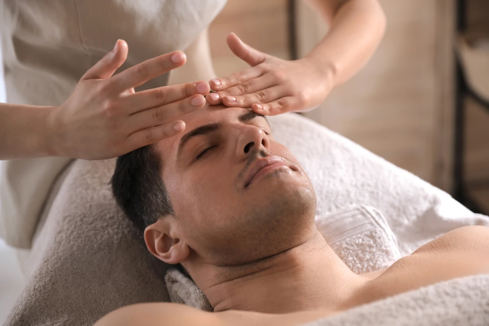 Man enjoying a relaxing med spa facials session.